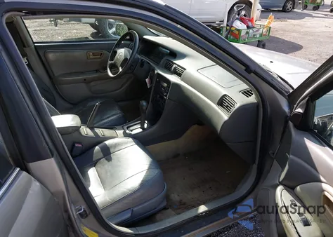 1999 Toyota Camry Le V6 from USA, damaged, VIN 4T1BF28K3XU083415